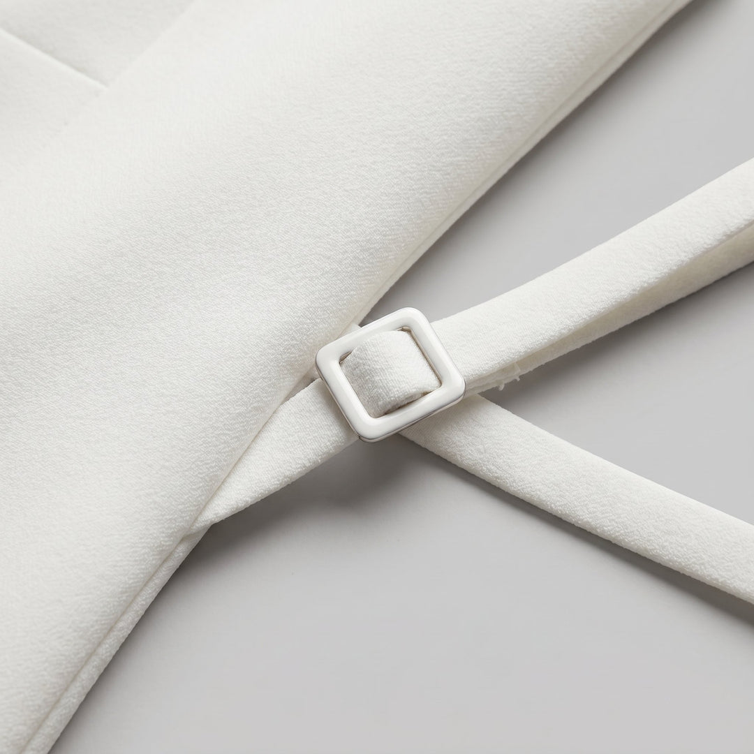 Camille white dress fabric and belt buckle close-up