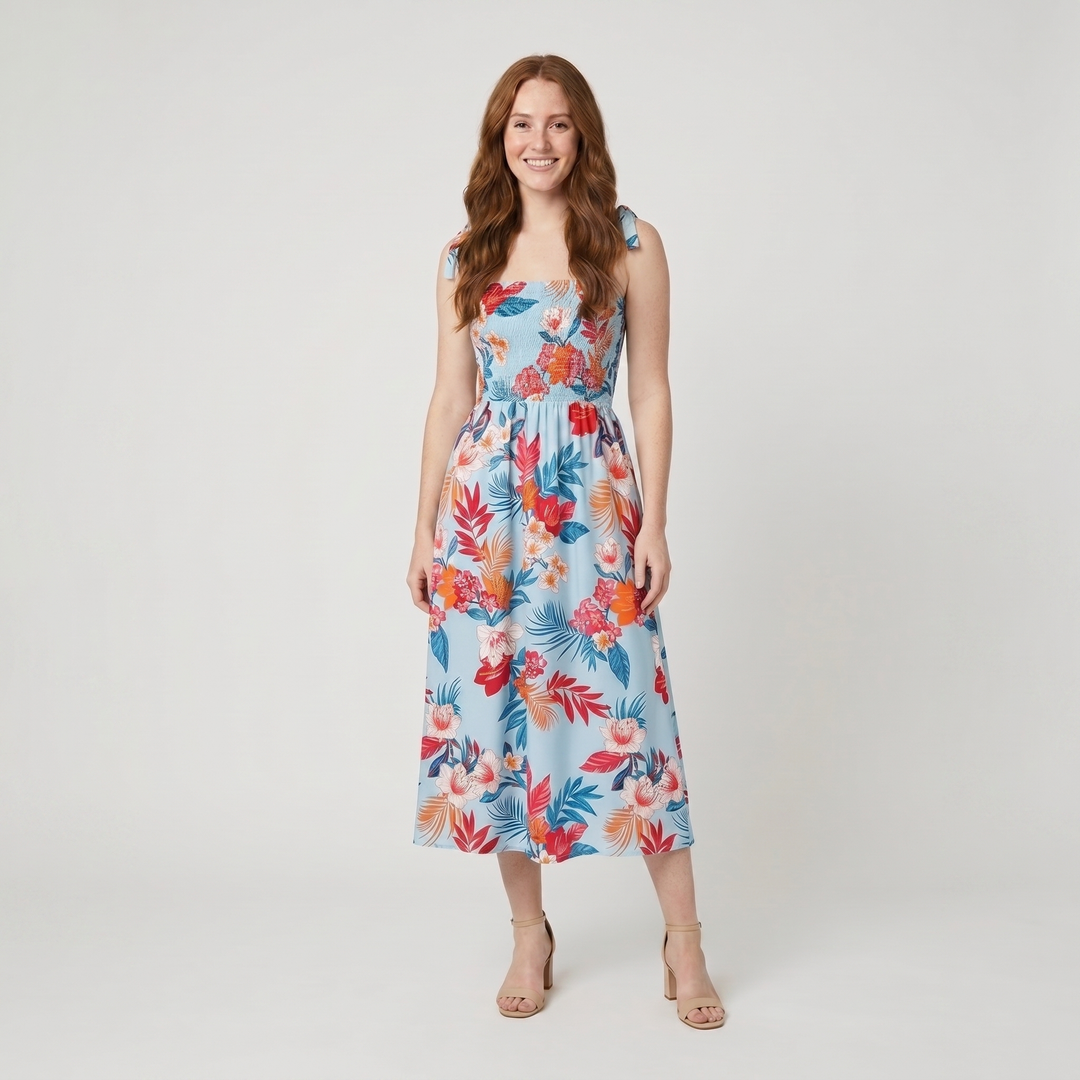 Capri light blue tropical floral sundress on model