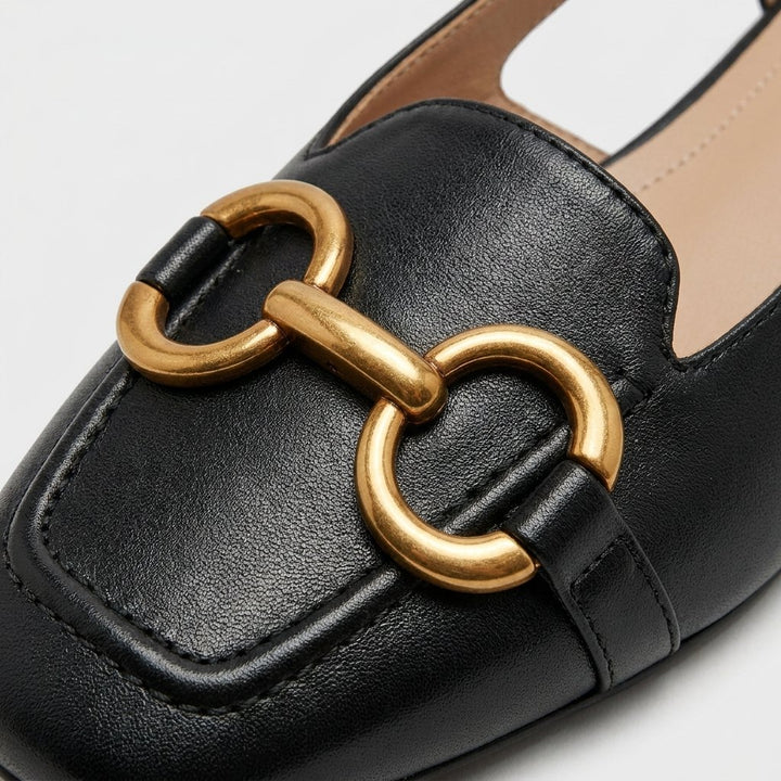 Celia slingback flat gold horsebit ornament close-up