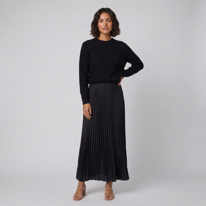 Clara black knit pullover and pleated skirt set