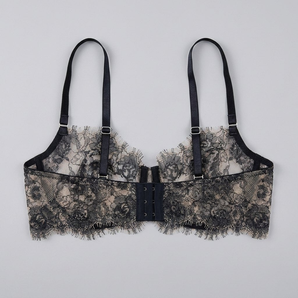 Navy lace balconette bra, back view showing the band and closure