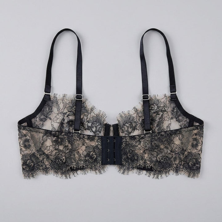 Navy lace balconette bra, back view showing the band and closure