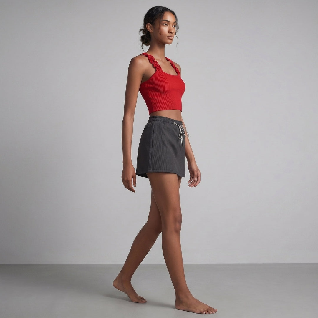 Coline red ribbed knit tank and skort set, side view on model