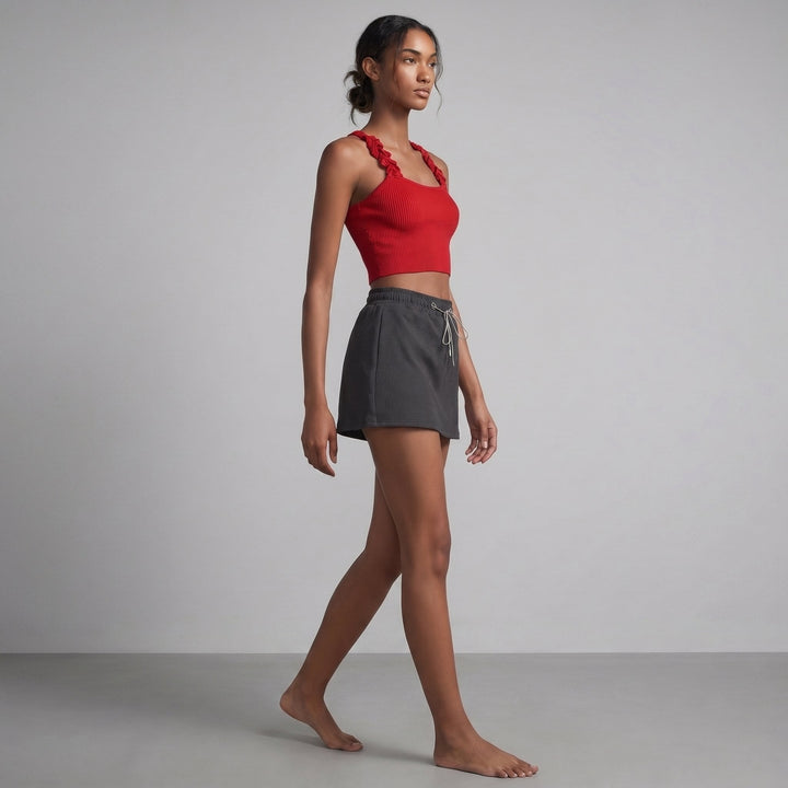 Coline red ribbed knit tank and skort set, side view on model
