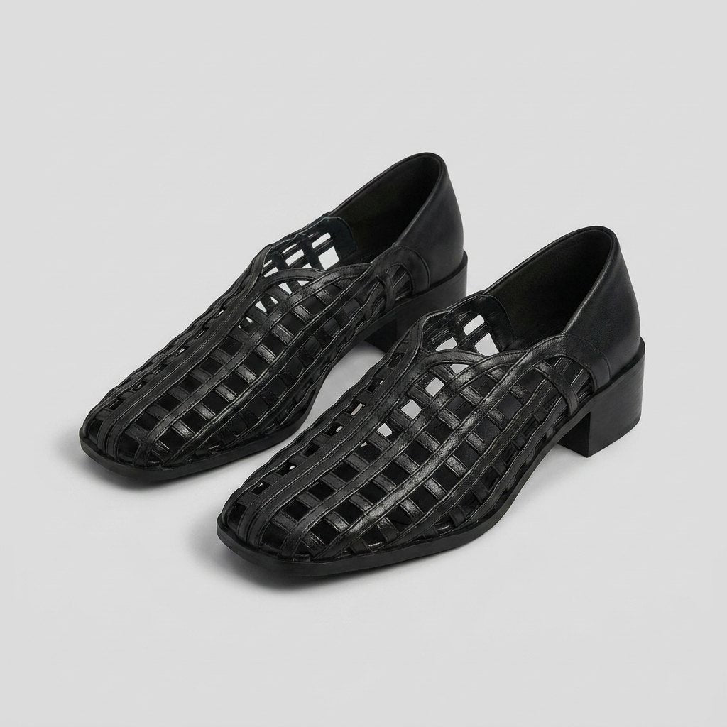 Cora black woven lattice flats, three-quarter front view