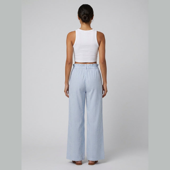 Cora white tank and blue stripe pants set, back view on model