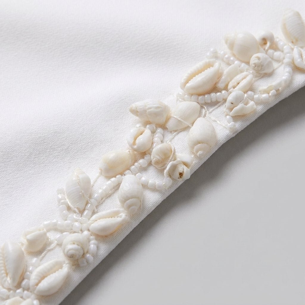 Cordelia hand-beaded shell trim detail