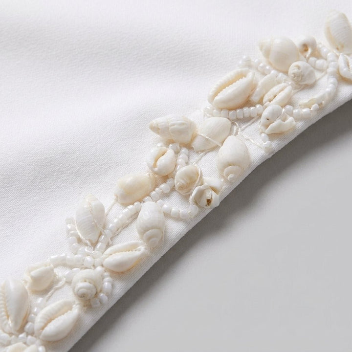 Cordelia hand-beaded shell trim detail