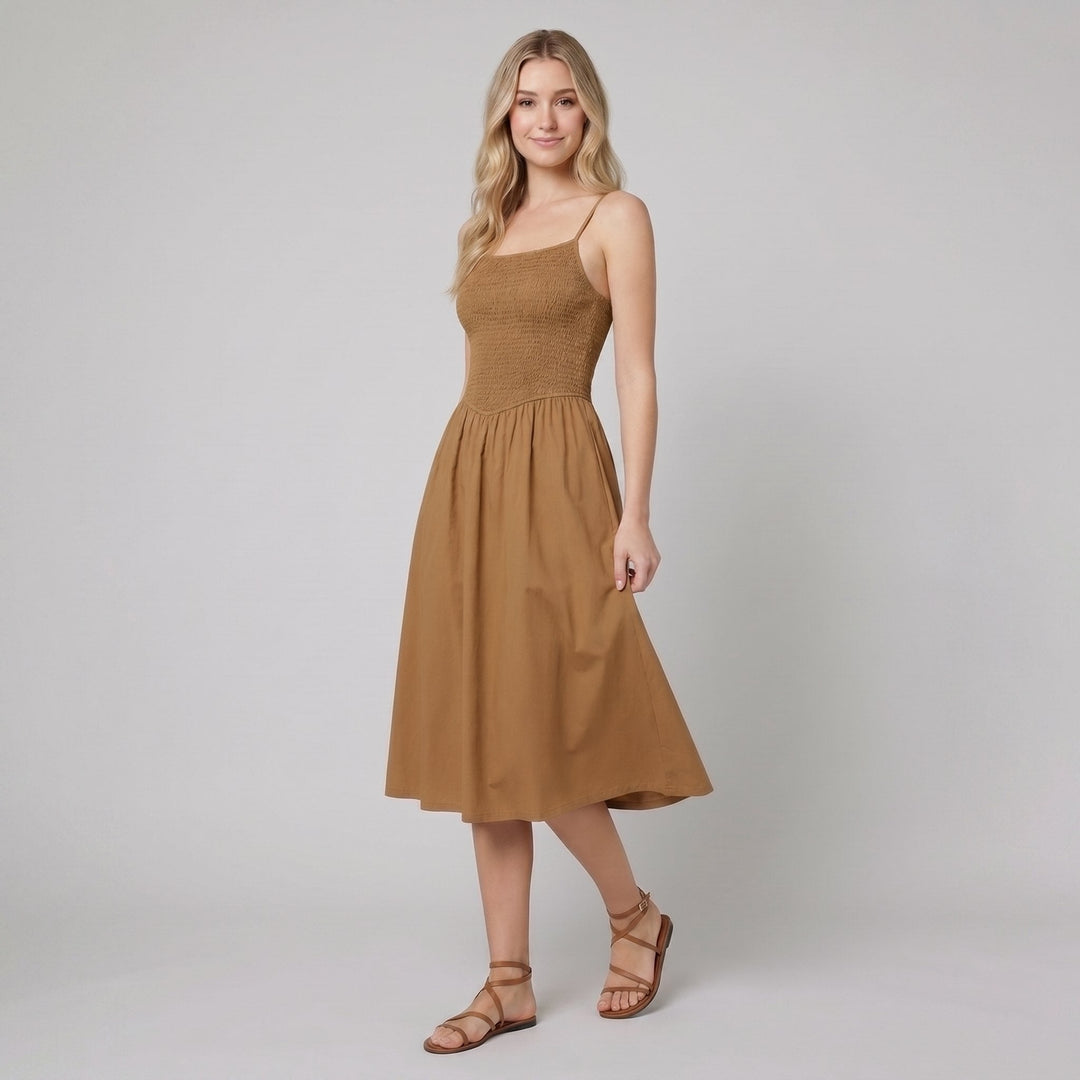 Brown A-line midi dress with a smocked bodice, side view on model