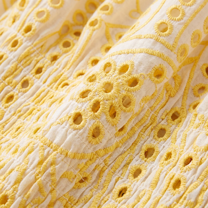 Dahlia eyelet fabric close-up detail