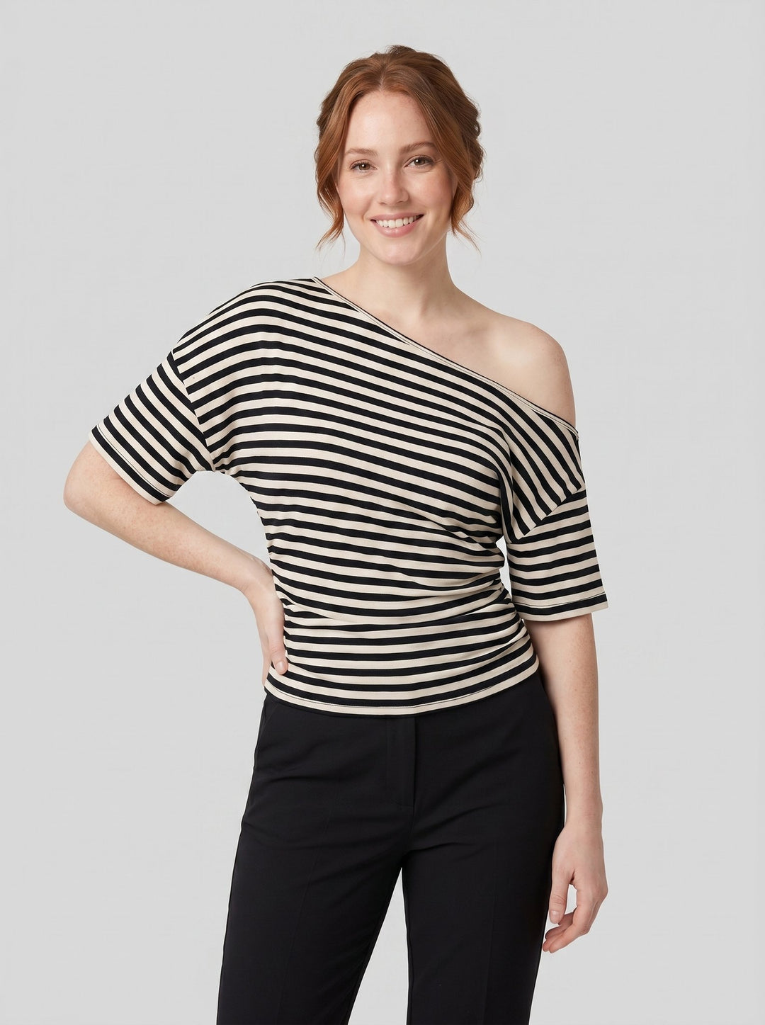 Daina striped one-shoulder top on model side pose