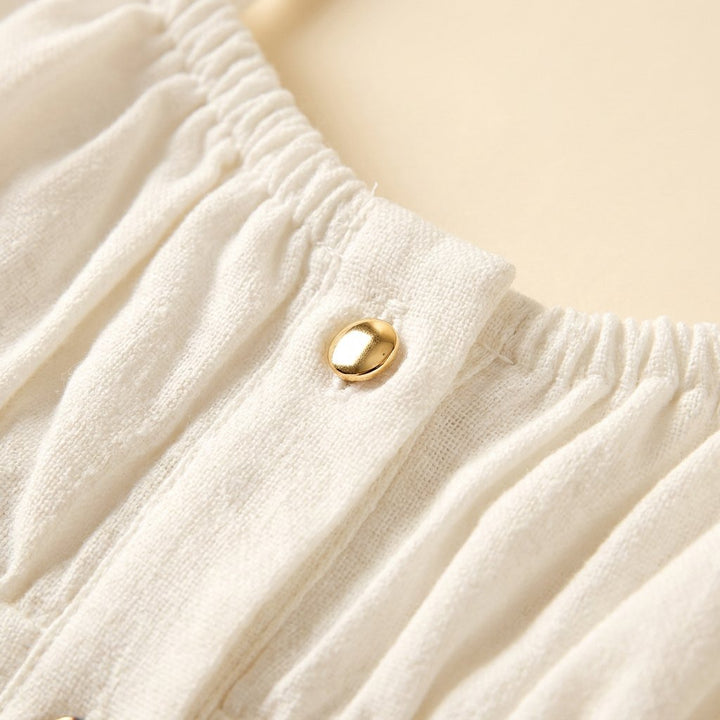 Daisy white summer dress fabric close-up