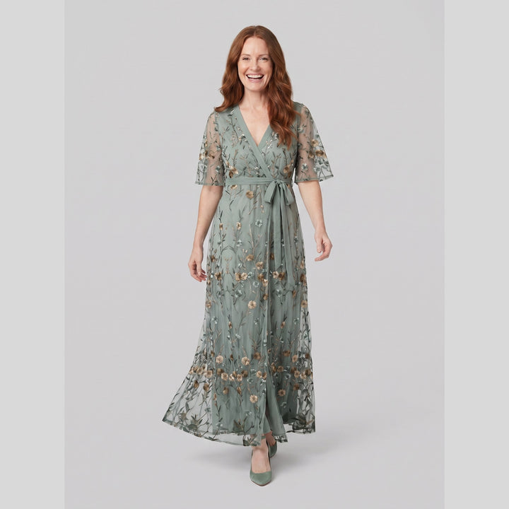 Sage green floral embroidered evening gown in movement - The store Vancouver