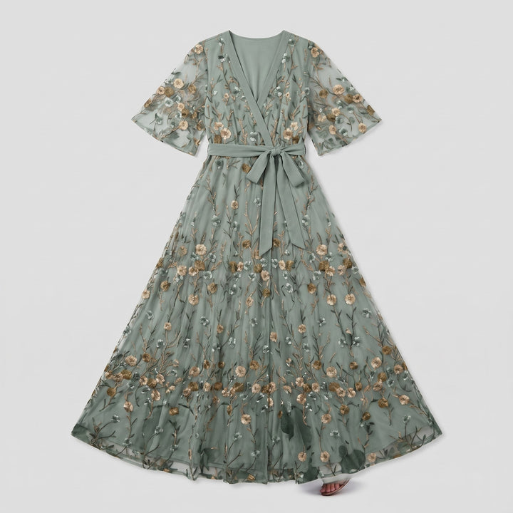 Sage green floral embroidered evening gown flat lay product photo - The store Vancouver