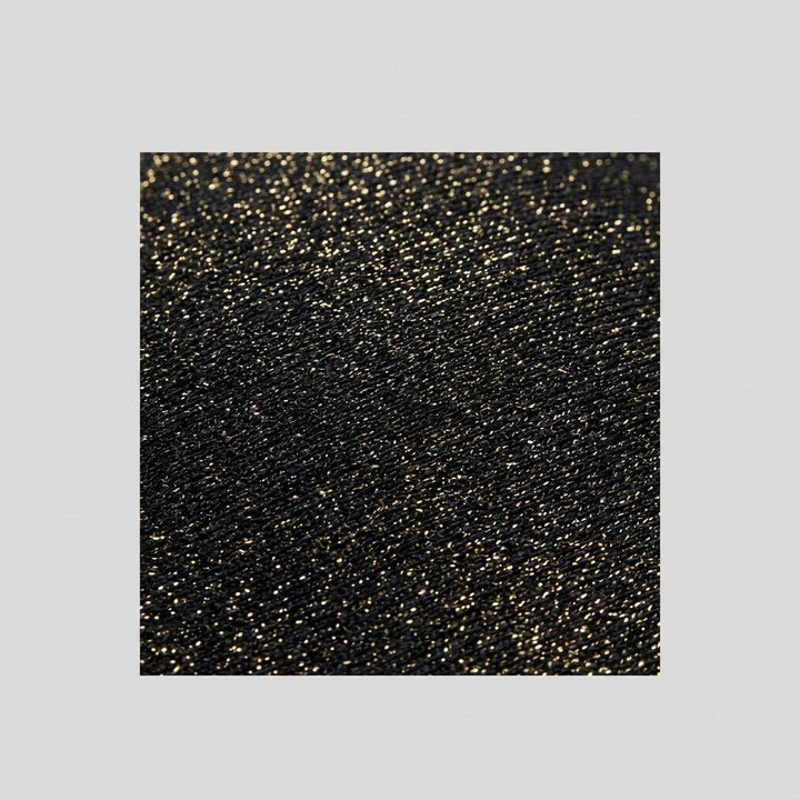 Black metallic lurex swimwear fabric close up