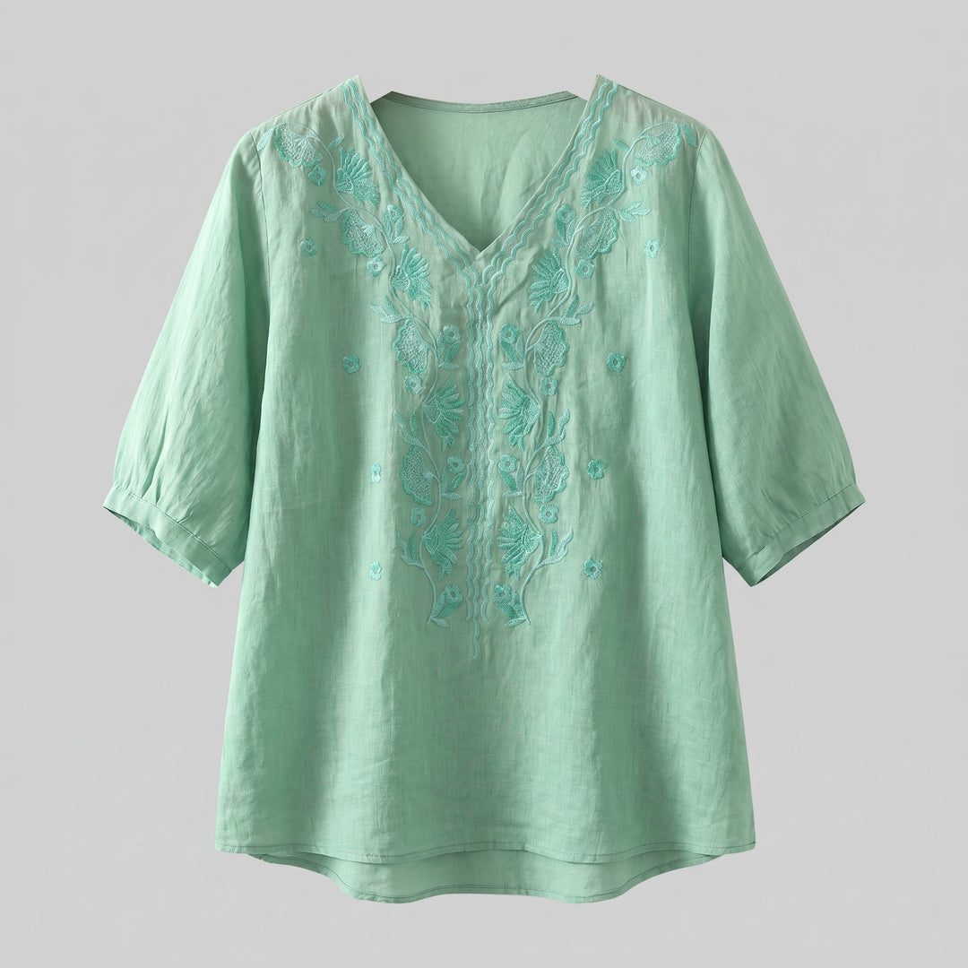 Eloria embroidered linen blouse product flat lay