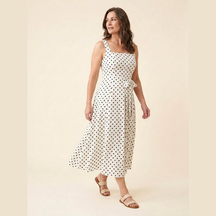 Elysia polka dot midi dress walking pose