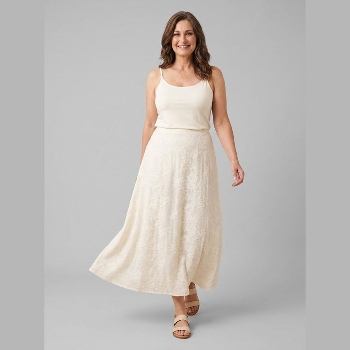 Elysian floral maxi skirt ivory walking pose on model