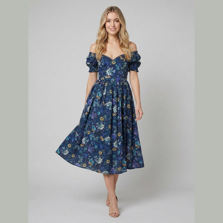 Elysian tapestry dress blue walking pose on model