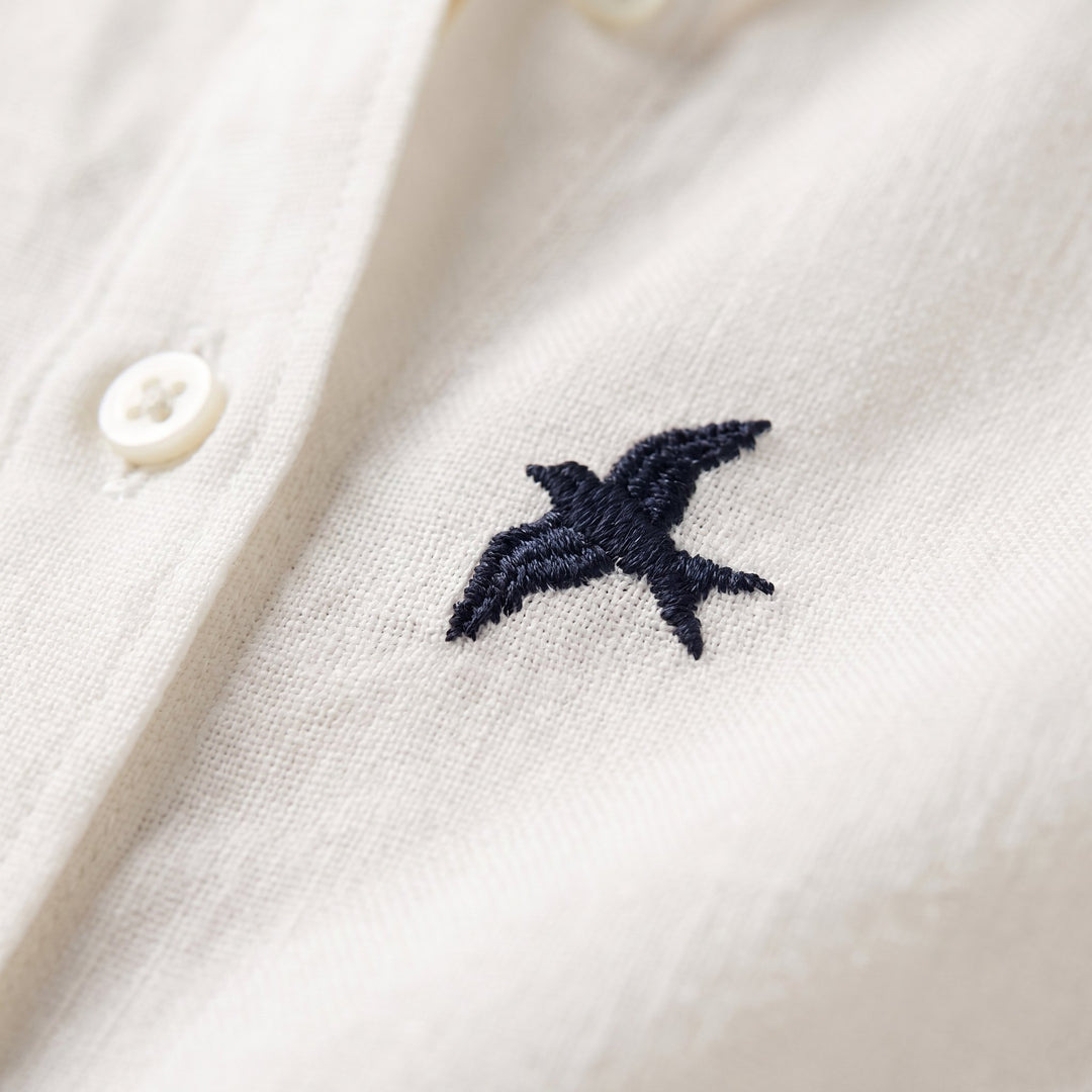Flora bird embroidery fabric detail