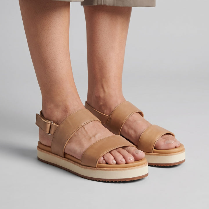 Almond flatform sandals worn on foot - The store Vancouver