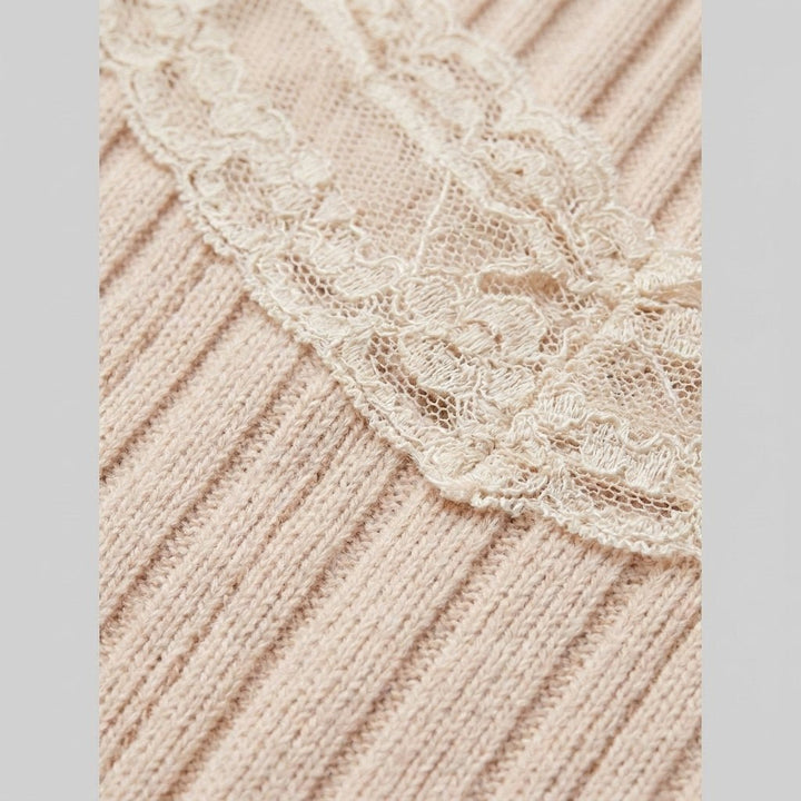 Glimmer beige maiden dress fabric close-up