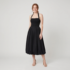 Haven black halter bubble-hem knit midi dress on model
