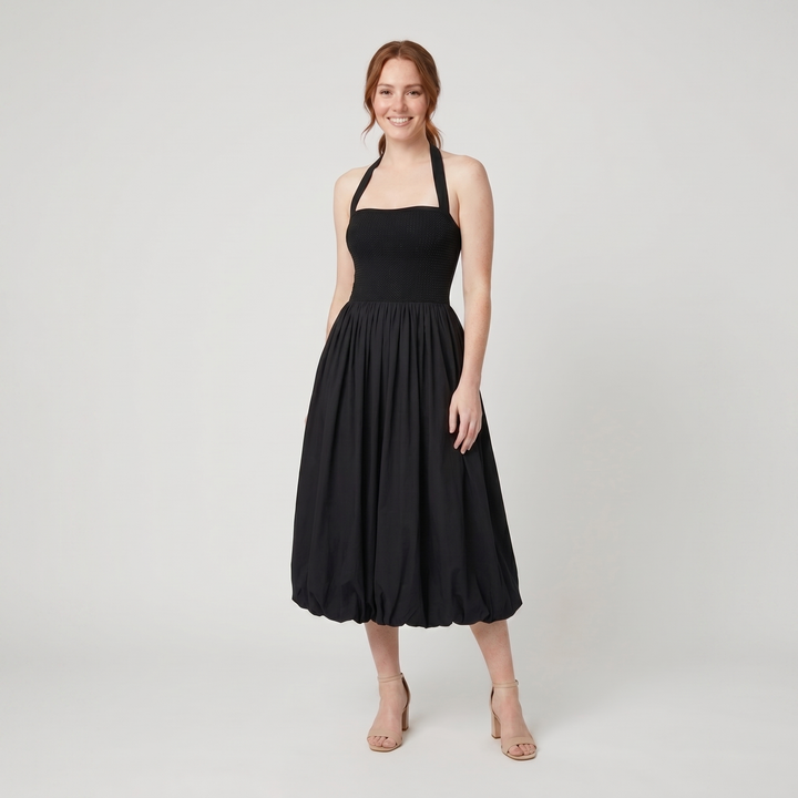 Haven black halter bubble-hem knit midi dress on model