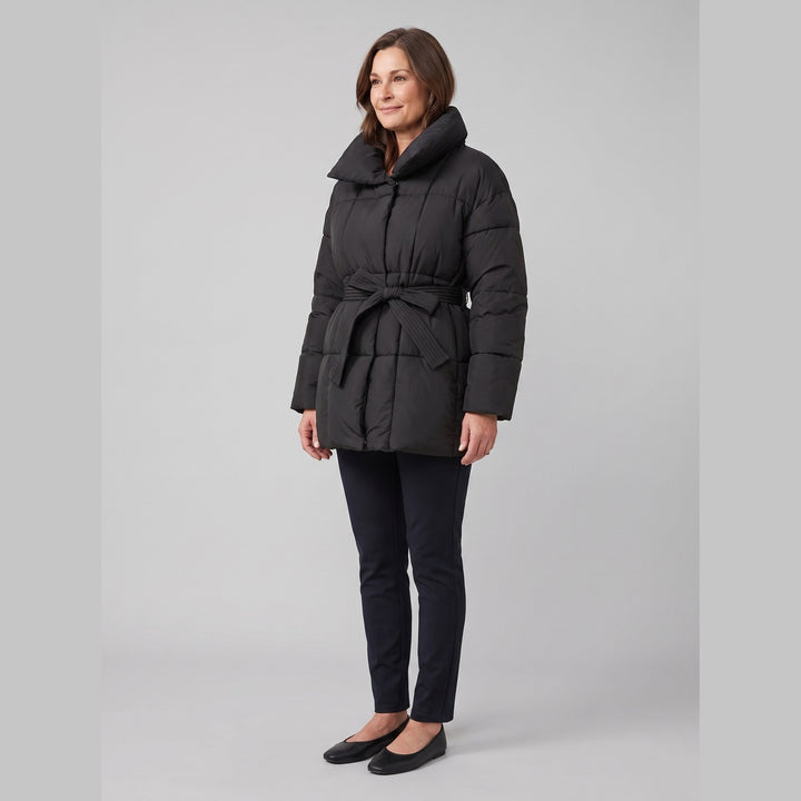 Hazel belted puffer coat in black on model