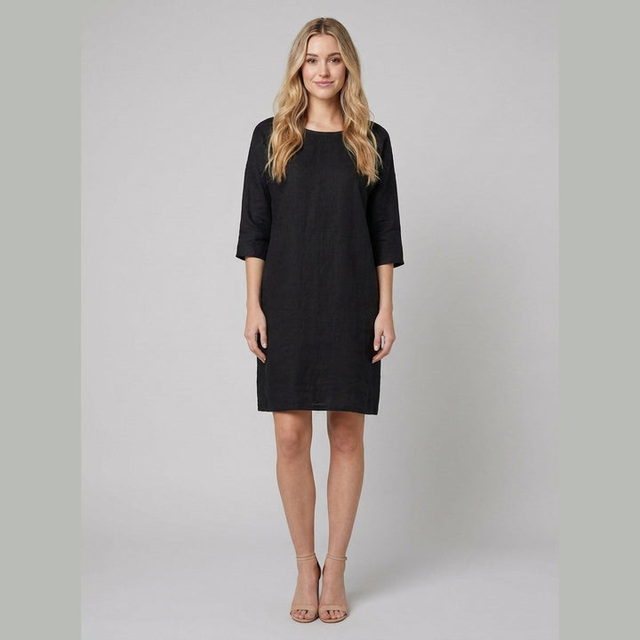 Henrietta black linen relaxed-fit knee-length dress front on model