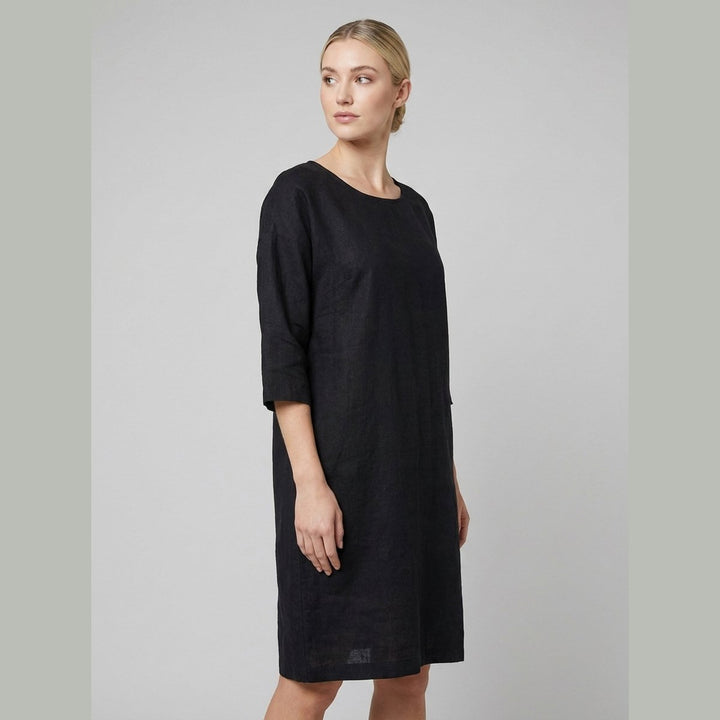 Henrietta black linen dress side pose on model