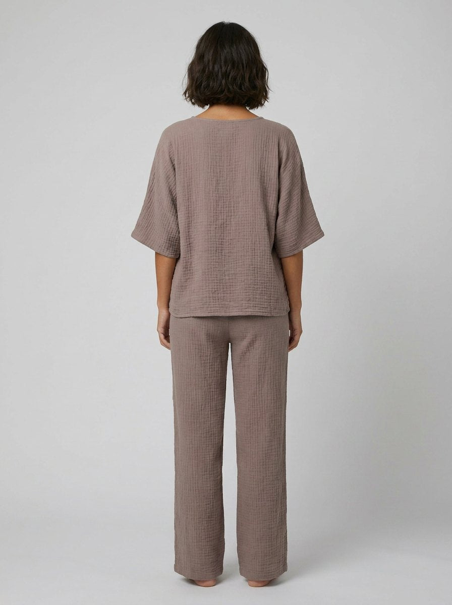 Taupe batwing sleeve top and ankle pants, back view on model