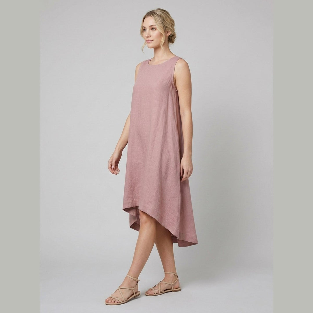 Mauve linen dress with asymmetrical high-low hem, walking pose