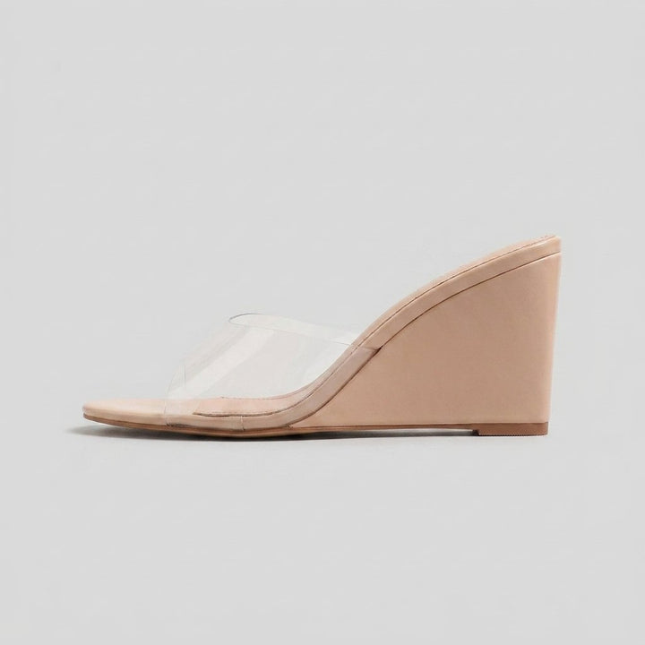 Iris clear wedge mule side profile