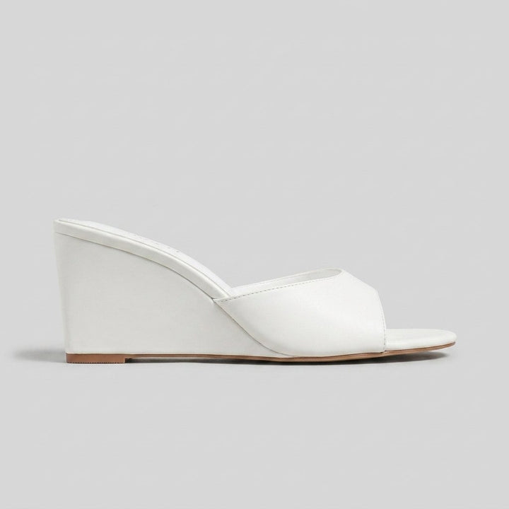Iris elegant wedge mule side profile