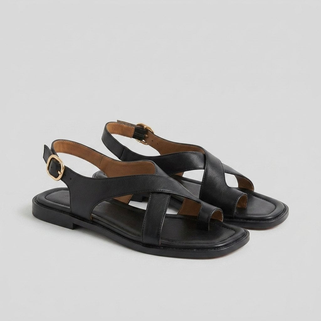 Ivy Cross Sandals black leather pair