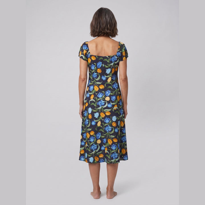 Ivy floral midi dress with square neckline, back view on model