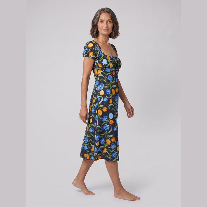Ivy floral midi dress with square neckline, side view on model