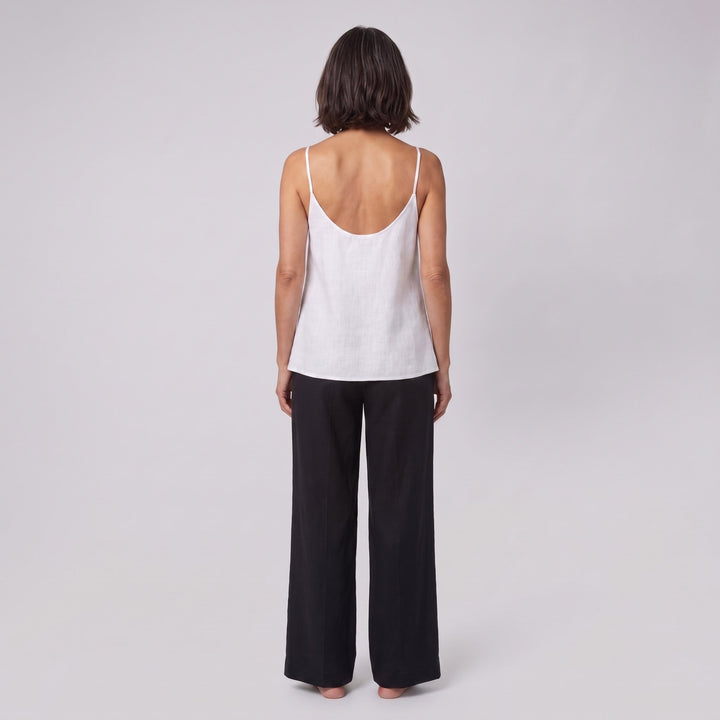 Jess V-neck linen camisole top in white, scooped back view on model