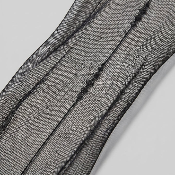 June line sheer tights fabric back-seam close-up