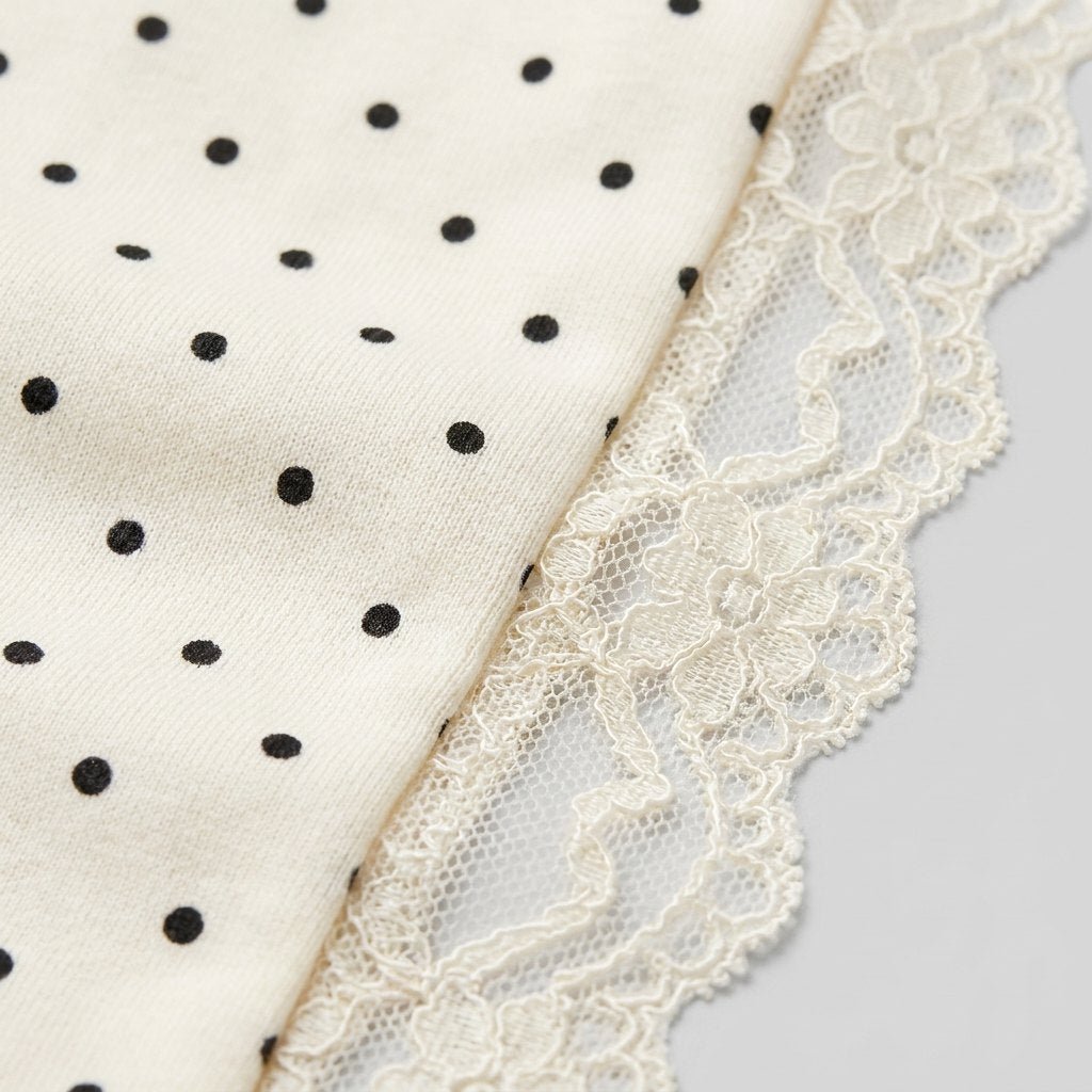 Lara mini dress lace trim fabric close-up
