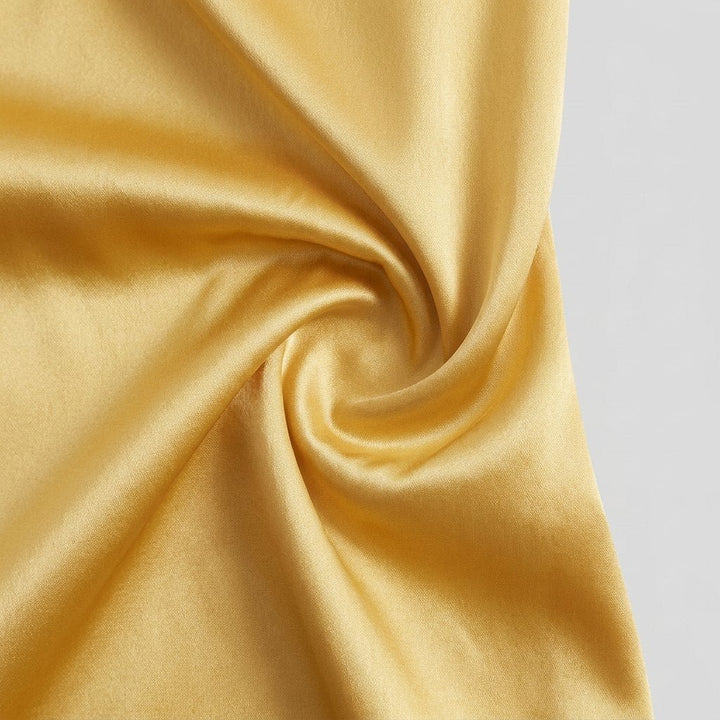Lavinia golden satin fabric detail