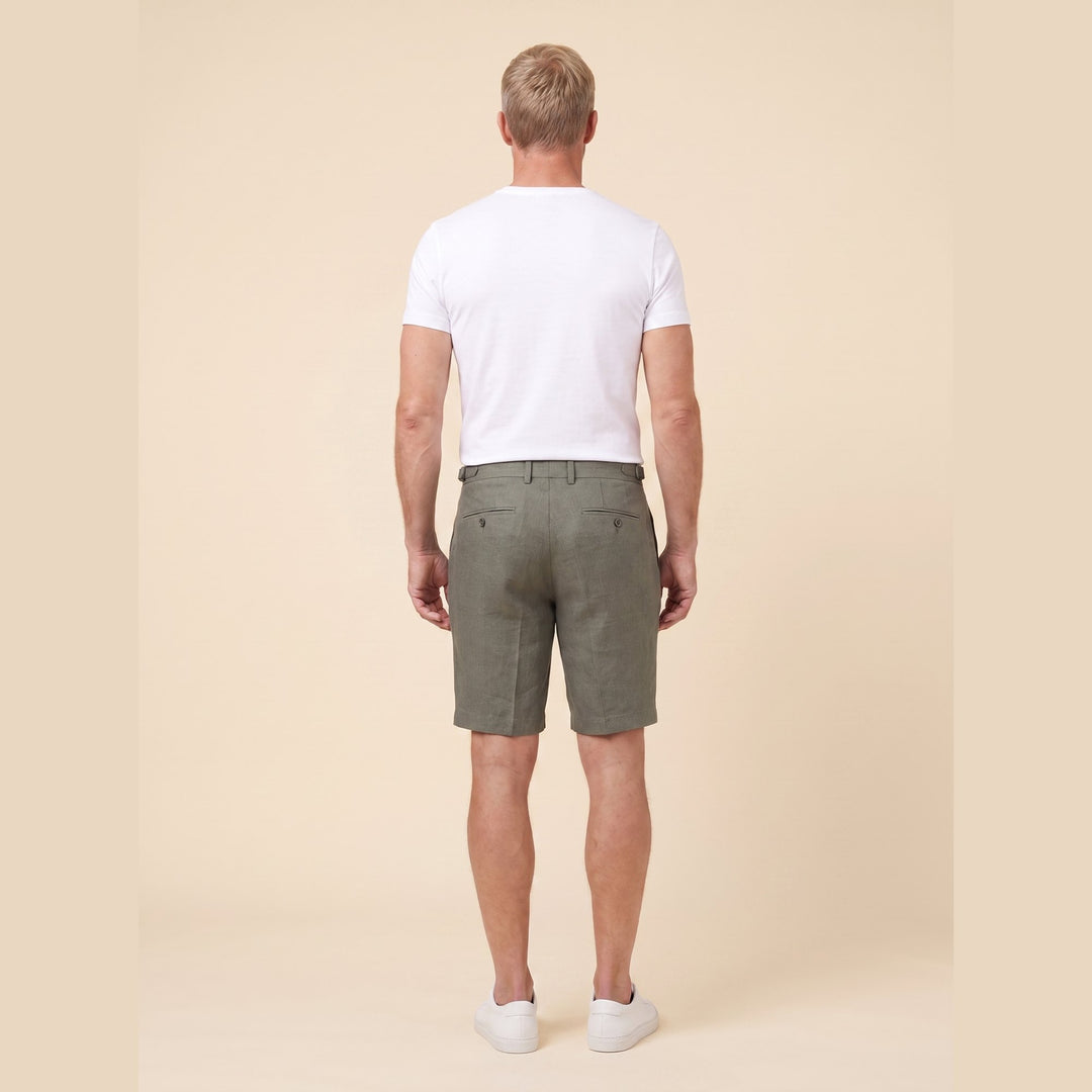 Olive linen Linden Bermuda shorts, back view on model