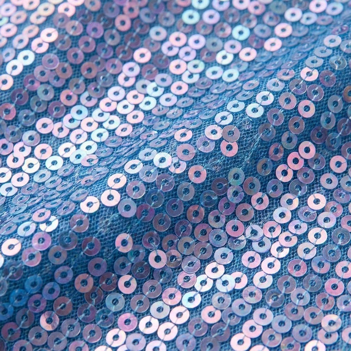 Close-up of the iridescent blue sequin mesh fabric