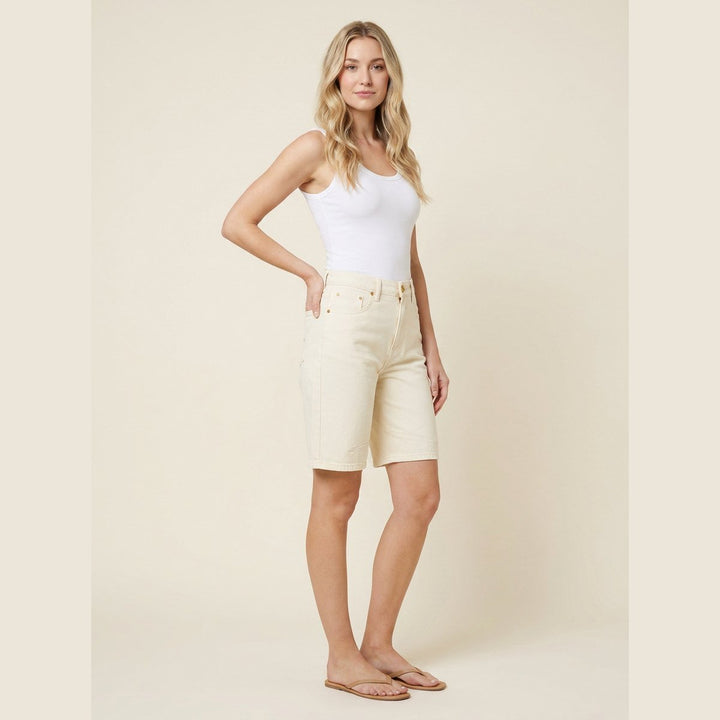 Luna ivory denim shorts three-quarter side on model