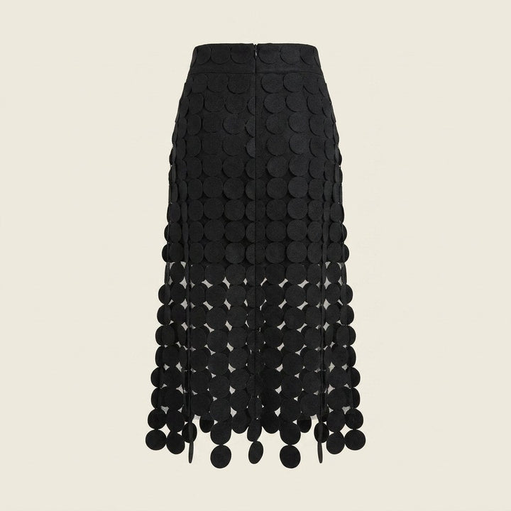 Luna black laser-cut disc midi skirt, back view on model