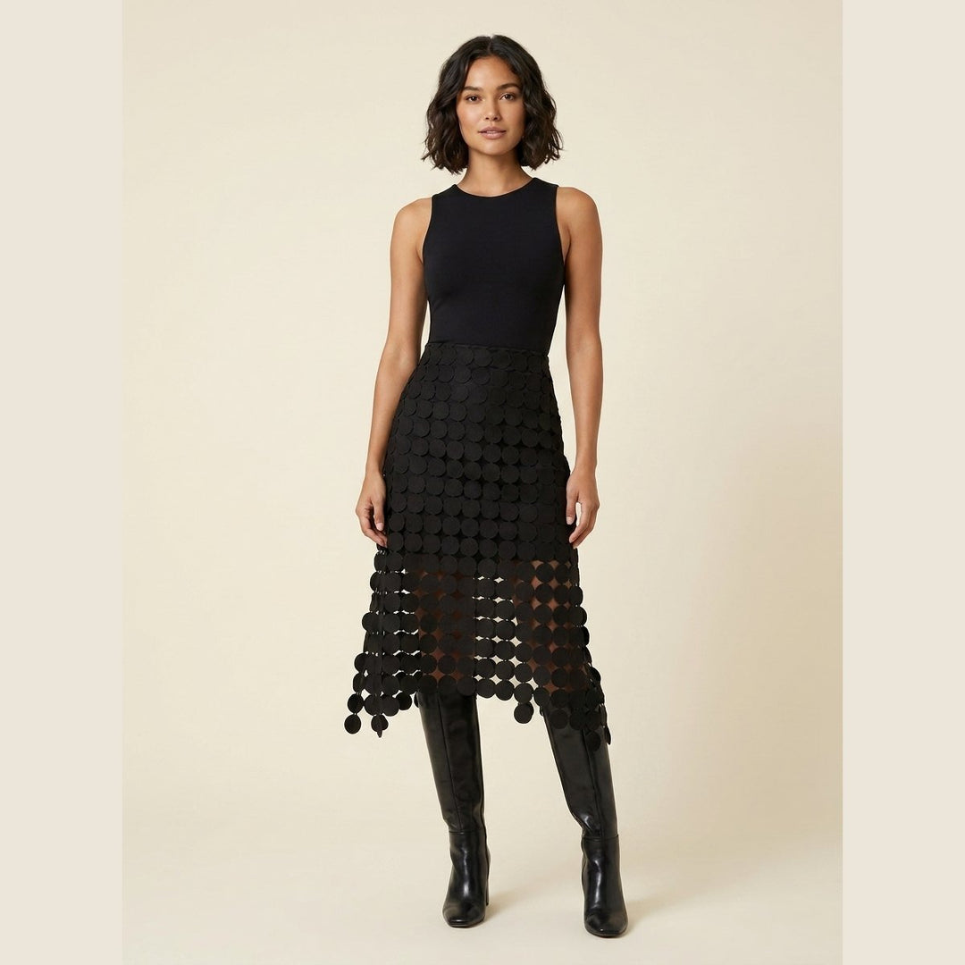 Luna black laser-cut disc high-waist midi skirt, front view on model