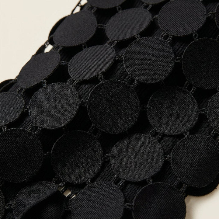 Luna midi skirt laser-cut disc fabric close-up