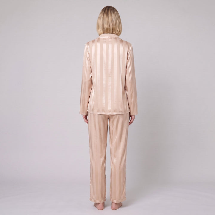 Luxe satin pajama set in champagne beige, back view on model