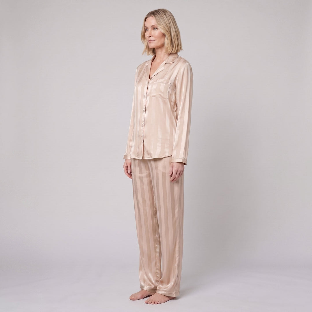 Luxe satin pajama set in champagne beige, side view on model